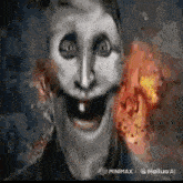 a drawing of a scary face with a fire behind it .