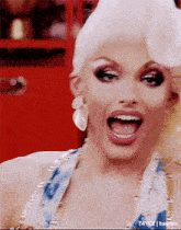 a close up of a drag queen 's face with t4yce tumblr in the bottom right corner
