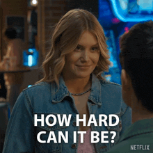 a woman in a denim jacket is asking how hard can it be .