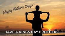 a father is carrying his son on his shoulders on a beach at sunset .