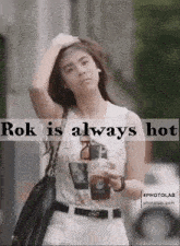 a picture of a woman with rok is always hot on it