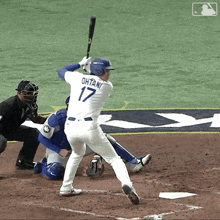 a baseball player with the number 17 on his jersey