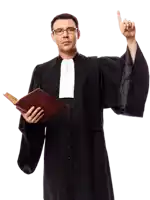 a man in a judge 's robe is holding a book and pointing upwards