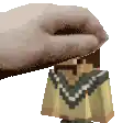 a pixel art of a hand holding a small cartoon character 's head .