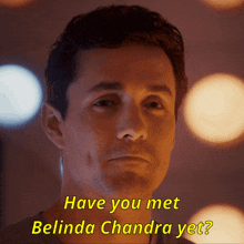 a man says have you met belinda chandra yet in yellow letters