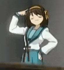 a cartoon girl in a white jacket and blue skirt is standing in a corner with her eyes closed .