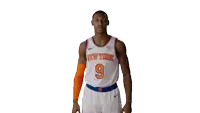 a basketball player with the number 9 on his jersey