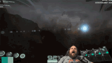 a man is playing a video game with a 92 percent score