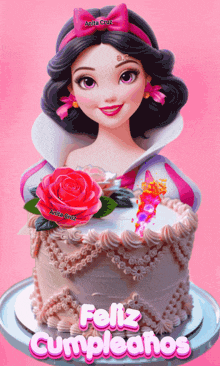 a birthday cake with a doll on it and the words feliz cumpleanos below it