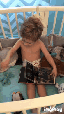 Baby Play GIF - Baby Play Read GIFs