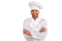 a smiling chef with his arms crossed and a white hat