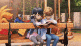 a boy and a girl are sitting on a bench looking at their cell phones .