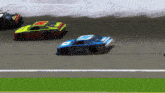 a blue race car with the number 30 on it