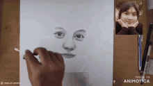a drawing of a woman 's face is being made by animatica