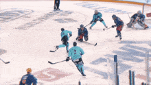 a hockey game is being played on a rink that has the word connection on it