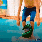 a painting of a person walking in the water with the number 3 on the bottom right