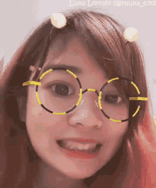 a close up of a woman 's face with glasses and the name luna lorraine