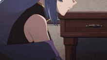 a girl with blue hair is holding a large piece of bread in her hands