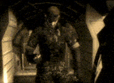 a man in a mask stands in a dark hallway