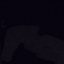 a blurry photo of a person wearing a black hat