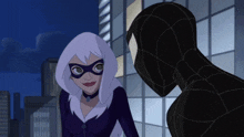 a woman in a mask is standing next to a man in a suit