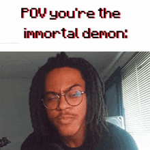 a man with dreadlocks and glasses is making a funny face with the words " pov you 're the immortal demon " below him