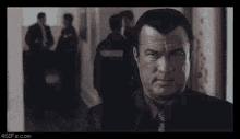 Steven Segal Serious GIF - Steven Segal Serious Someone Is Going To Get Hurt GIFs