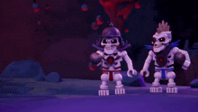 a couple of bones are sitting on top of a purple surface .