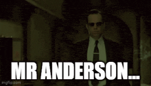 a man in a suit and tie with sunglasses says mr anderson ...