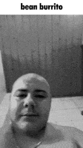 a black and white photo of a man with the words bean burrito on the bottom
