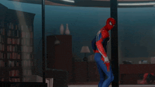 a man in a spiderman costume is flying through the air