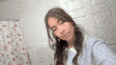a woman taking a selfie in a bathroom