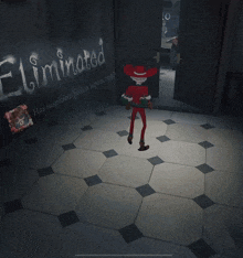 a man in a red cowboy hat stands in front of a wall that says eliminated