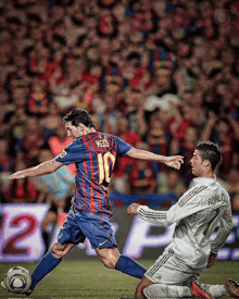 a soccer player wearing a number 10 jersey kicks the ball