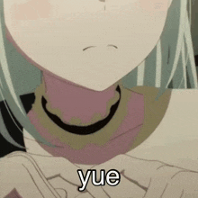 a close up of a girl 's face with the word yue on the bottom