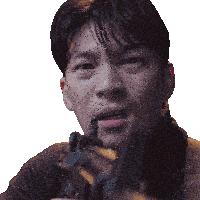 a close up of a man holding a gun