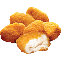 a pile of fried chicken nuggets with a bite taken out of one