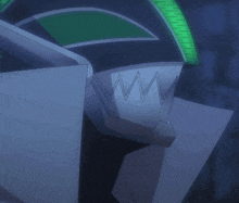 a close up of a robot with a green light coming out of it 's eyes
