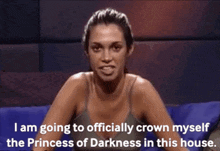 a woman is saying that she is going to officially crown herself as the princess of darkness in this house