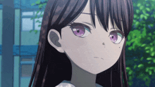 a close up of a girl with purple eyes looking at the camera