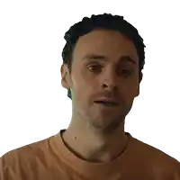 a man in a brown shirt is saying " i know "