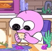 a cartoon character with big eyes is sitting at a table eating a cookie .
