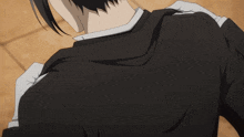 a close up of a person 's neck and shoulder