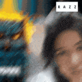 a blurry picture of a woman with the letters razz on it