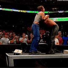 dean ambrose seth rollins dirty deeds announce table wwe