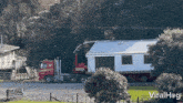Moving House Using A Truck Viralhog GIF - Moving House Using A Truck Viralhog Whole House Transferring GIFs