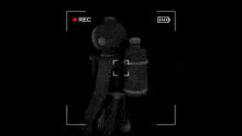 a video game is being recorded with a camera .