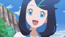 a girl with blue hair and blue eyes looks at the camera