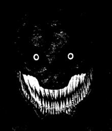 a black and white drawing of a monster 's face with big teeth and a smile .