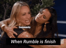 two women are hugging each other with the words community when rumble is finish below them